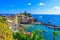 Vernazza - Village of Cinque Terre National Park at Coast of Italy. Beautiful colors at sunset. Province of La Spezia, Liguria, in