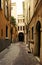 VERONA, ITALY - AUGUST 17, 2017: Narrow street of Verona high vibrant building facades.