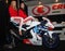 Verona, Italy - january 20, 2018: motor bike expo, two young hostess posing on motorbike. Verona, Veneto, Italy