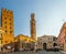VERONA, ITALY, MARCH 19, 2016: people are strolling through piazza die signori dominated by torre die lamberti in the
