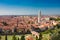 VERONA, ITALY- September 09, 2016: Panorama of city Verona, Italy. Scenery with Adige River, Bell towers of churches, tile roofs o