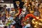 Verona, Italy â€“ March 2019. Venetian masks at market in Historic town square Elbe with stairs surrounded by cafes and buildings