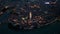 Verona skyline, aerial view of historical city centre at night evening, Italy