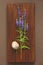 Veronica long-leaved violet color lies on a wooden background of