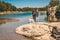 Vers-Pont-du-Gard, Gard / Occitanie / France - September 26, 2018: Idyllic picture of people on the background of a calm river