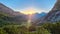 Vertatscha - Hiking trail along alpine meadow of flowers at sunrise in untamed Karawanks