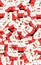 Vertical 3D image of multiple and different sizes of Santa crosses stacked and overlapping chaotically, background texture, visual