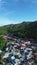 Vertical aerial footage of small town in the morning