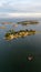 Vertical aerial shot of Thimble Islands in Branford with a beautiful waterscape and a skyline