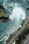 Vertical aerial view of the Niagra Falls with a rainbow