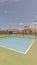 Vertical All weather green and blue pickleball court
