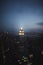 Vertical amazing shot of the Empire State Building and cityscape at night