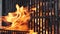 Vertical barbecue grill, slow motion bbq burning fire flame, closeup fireplace
