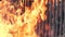 Vertical barbecue grill, slow motion bbq burning fire flame, closeup fireplace