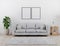 Vertical black poster frame mock up. Modern living room with grey sofa mockup. scandinavian style, cozy and stylish interior