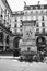 Vertical black and white shot of the Fountain of Mars in Paris, France