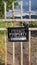 Vertical Close up of a locked gate at a private property with view of lake and mountain