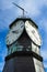 Vertical closeup of Aker Brygge Clock Tower is one of the distinctive landmarks of Oslo, Norway