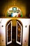 Vertical closeup of the doors of the altar of a church with a picture of the Last Supper