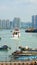 Vertical closeup of a port with ships in the urban area of Shanwei City, Guangdong Province, China.