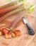 Vertical Closeup of Rhubarb Stalks and Pieces with Knife