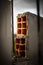 Vertical closeup shot of bricks and metal reinforcements on construction site