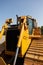 Vertical closeup shot of a bulldozer in a construction site