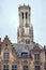 Vertical closeup shot of the famous Belfry of Bruges in  Belgium with a clear sky background