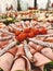 Vertical closeup shot of hams on a buffet table