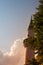 Vertical closeup shot of a minaret at sunset