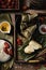 Vertical closeup shot of preparation of rice dumplings with banana leaves