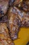 Vertical closeup shot of the textural details of a homemade delicious chicken wing