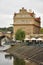 Vertical closeup shot of the Vltava river bank and Club Lavka builing in Prague, Czech Republic