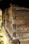 Vertical closeup shot of wooden planks on the exterior of a cabin