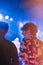 Vertical closeup of two guys at a rock concert in Coimbra, Portugal.