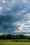 Vertical cloudscape over pasture farmland