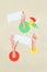 Vertical collage illustration of arms fingers hold empty space dialogue bubble paper windmill spinner isolated on