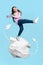 Vertical collage illustration of positive small girl stand huge crumpled paper ball dance flying airplanes isolated on