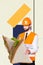 Vertical collage picture of construction worker guy arms hold huge sandwich isolated on creative background