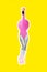 Vertical collage portrait of slim girl legs black white gamma pink flamingo body wear rollerblades isolated on yellow