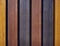Vertical coloured boards for fencing or wall decoration