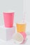 Vertical composition of bright paper disposable, compostable, recyclable cups