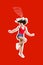 Vertical creative artwork collage image of excited cheerful girl jump dance isolated on red background