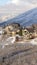 Vertical crop Winter in Utah with snowy Wasatch Mountains and lovely mountain homes views