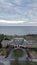 Vertical drone shot of the Aldrich Mansion on the coast of a sea in Warwick, Rhode island, USA