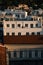 Vertical drone shot of residential buildings at sunset