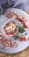 Vertical food banner. Tasty dessert. Berry tart red and black currants with almonds. Top view