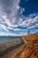 Vertical frame. Baikal lake with mountains and beautiful clouds and light.