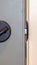 Vertical frame Close up of locked deadbolt latch on home door