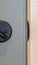Vertical frame Close up of unlocked deadbolt latch on home door